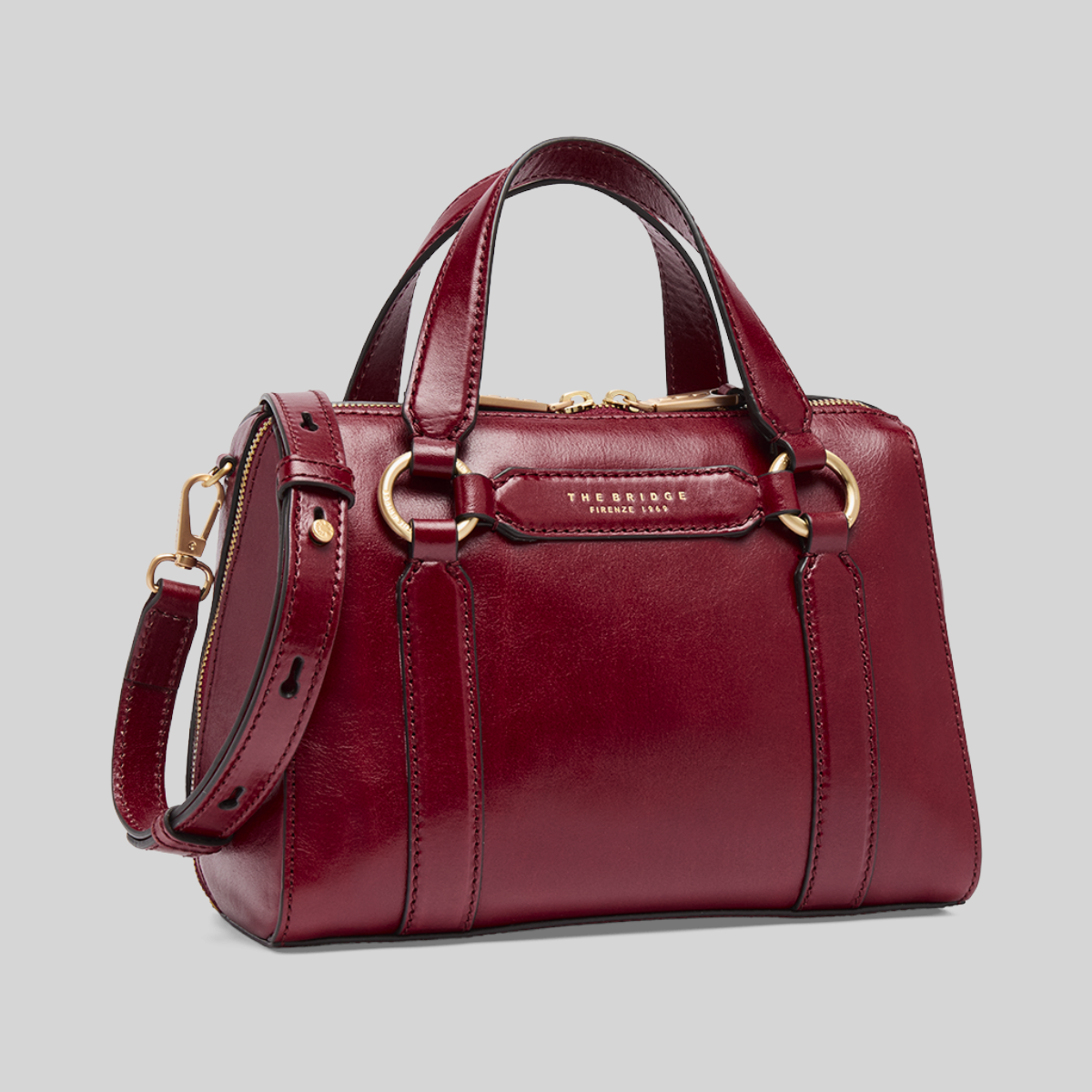 Borsa a mano LIBUTTI in pelle bordeaux con tracolla removibile e dettagli metallici dorati