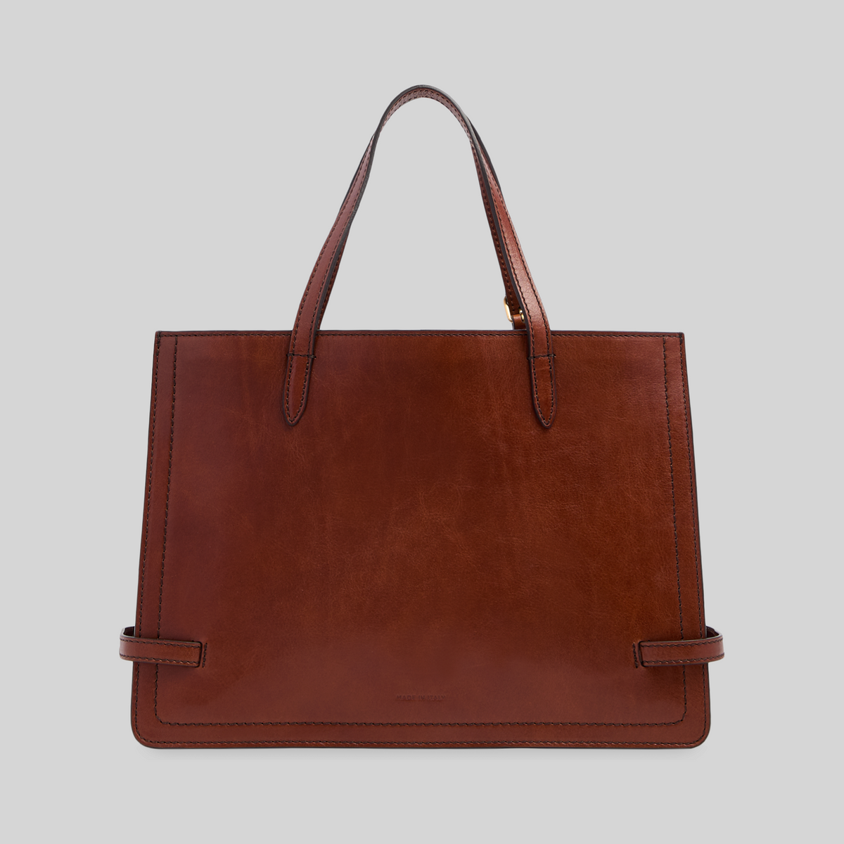 Borsa shopping LIBUTTI in pelle marrone pieno fiore con manici lunghi e finiture dorate, design italiano minimalista.