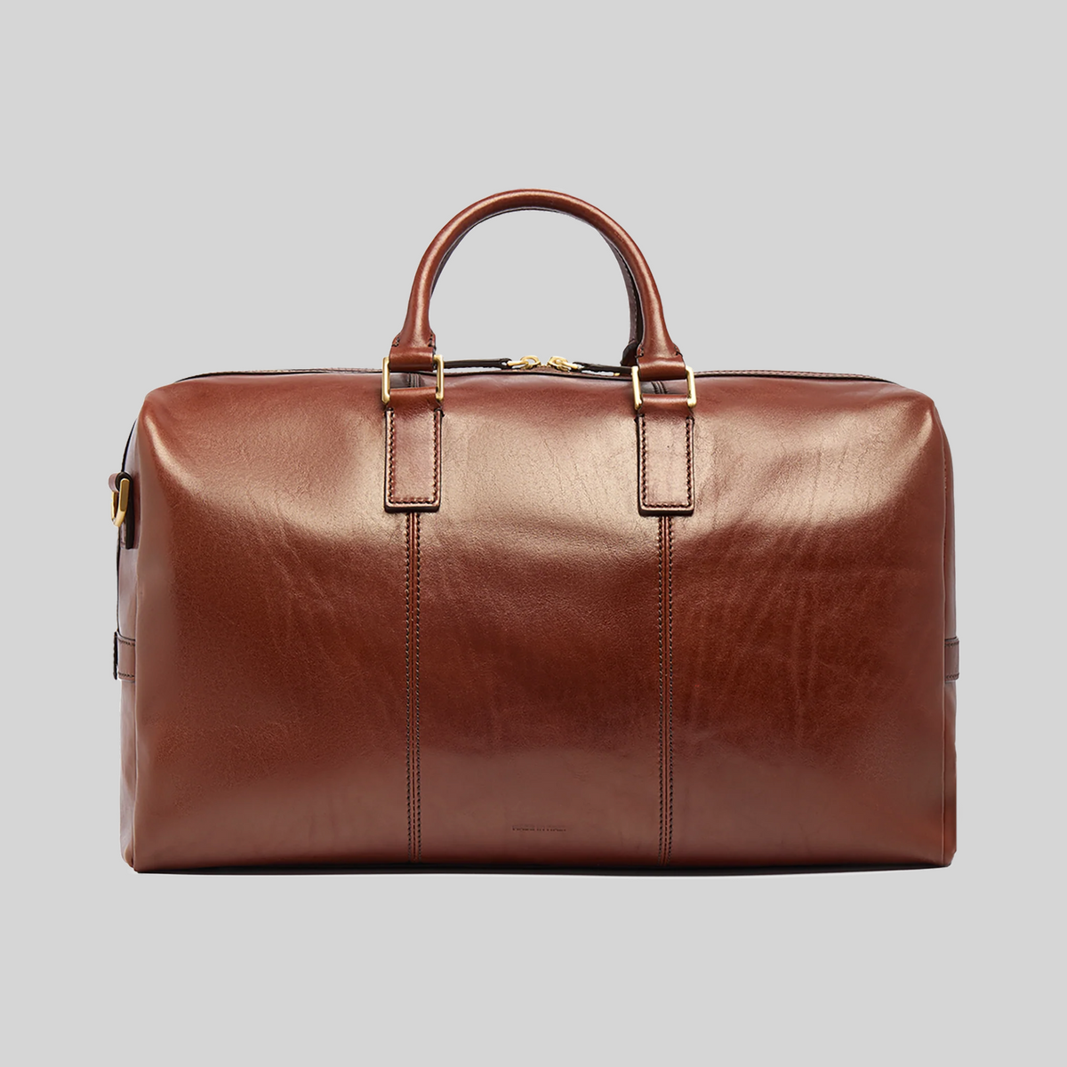 Borsone medio LIBUTTI in pelle marrone con manici robusti e dettagli dorati, ideale per viaggi eleganti.