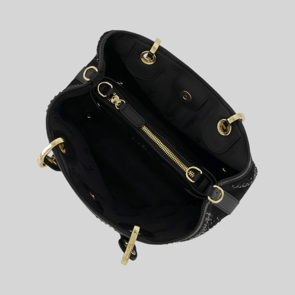 Interno della borsa LIBUTTI Braccialini Beth in nero con dettagli dorati, fodera logata e chiusura a zip centrale