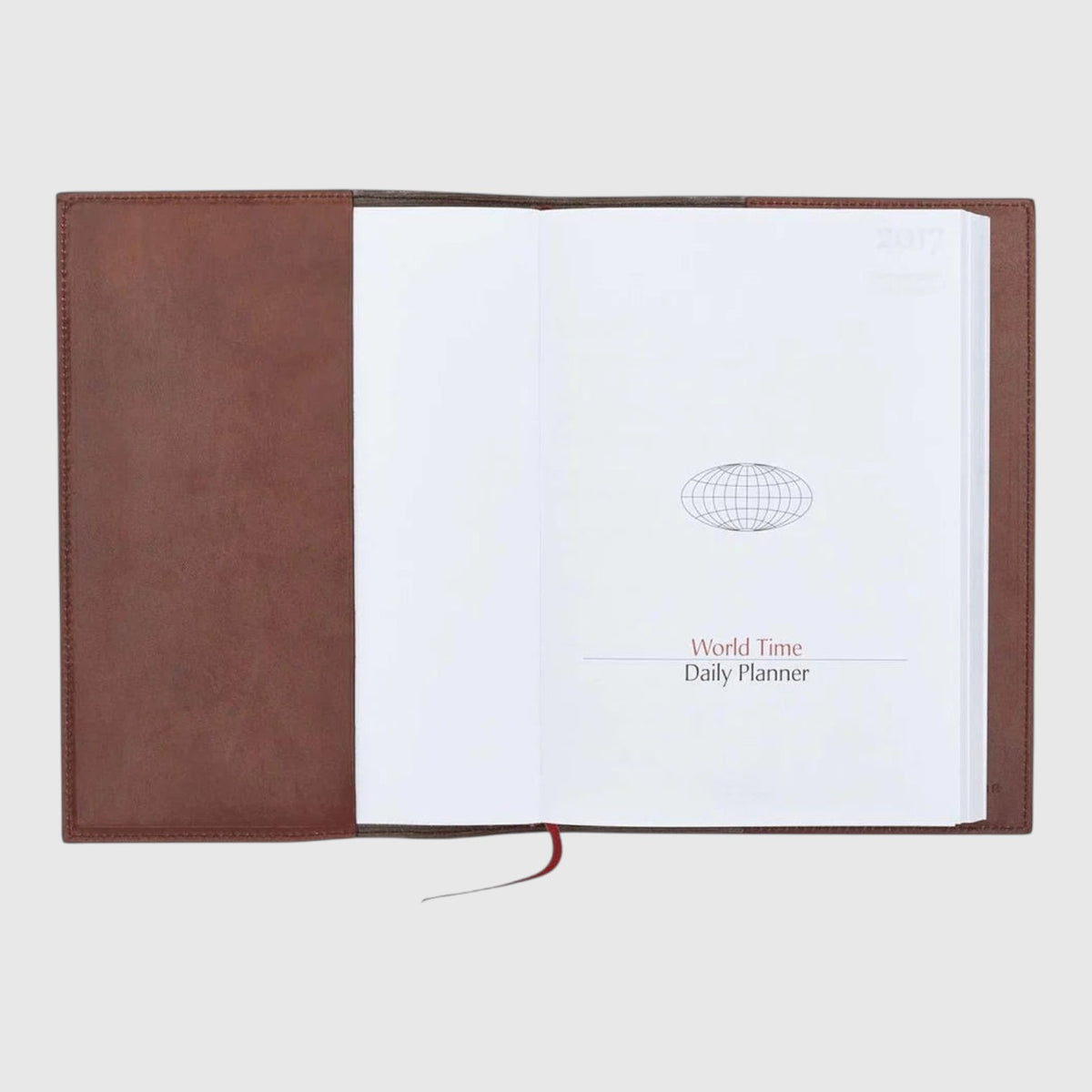 Agenda LIBUTTI in cuoio marrone 15x21 cm con rilegatura cucita e pagine interne bianche, vista aperta