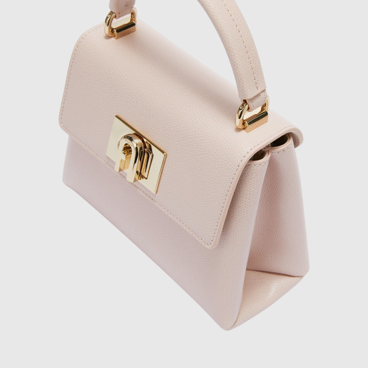 Mini borsa a mano LIBUTTI Furla 1927 in pelle rosa granata con chiusura a girello dorata e logo Arco