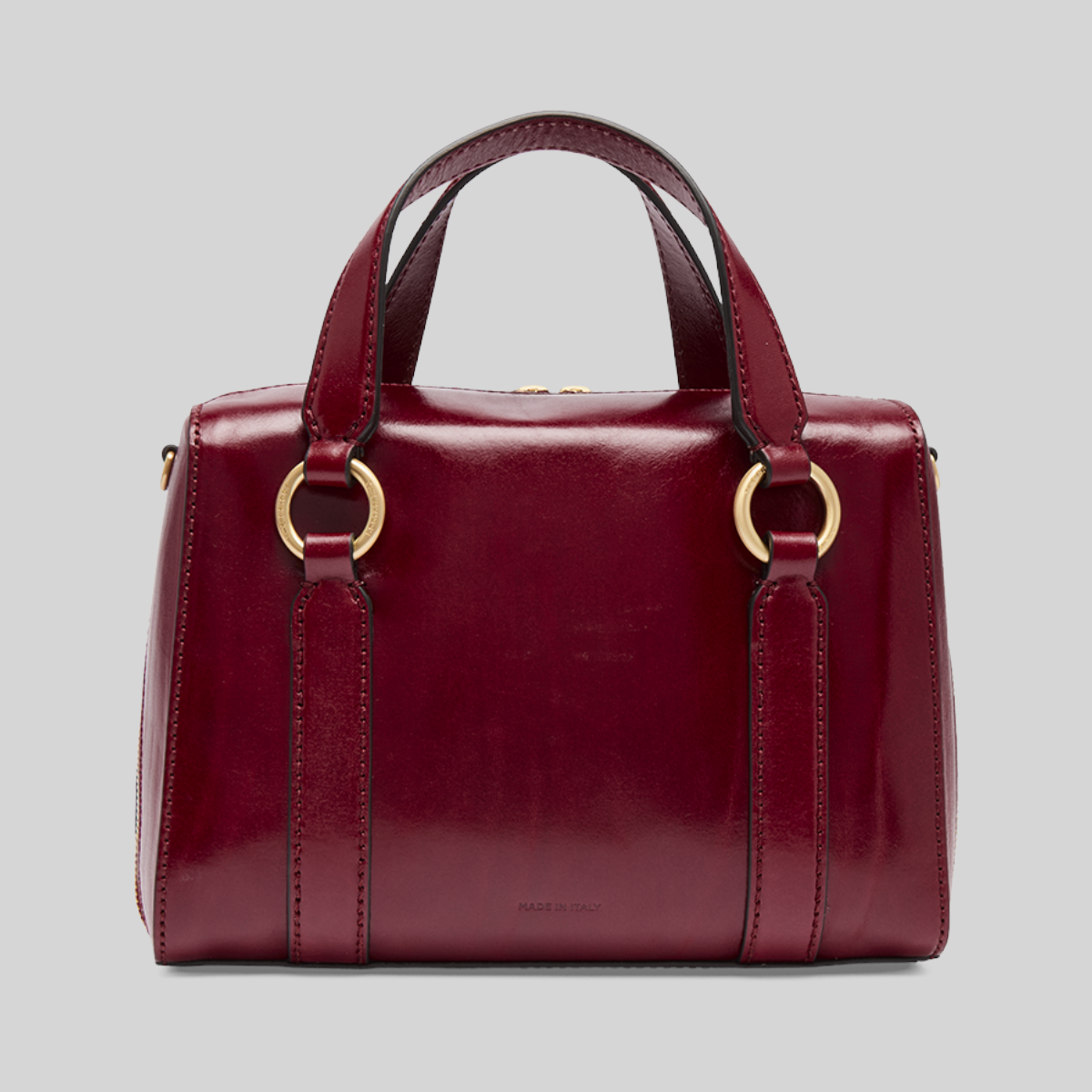 Borsa a mano LIBUTTI in pelle bordeaux con manici rigidi, dettagli dorati e tracolla removibile