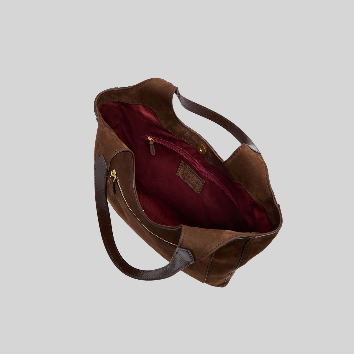 Borsa hobo LIBUTTI in camoscio marrone con interno rosso, manici in pelle e chiusura a zip