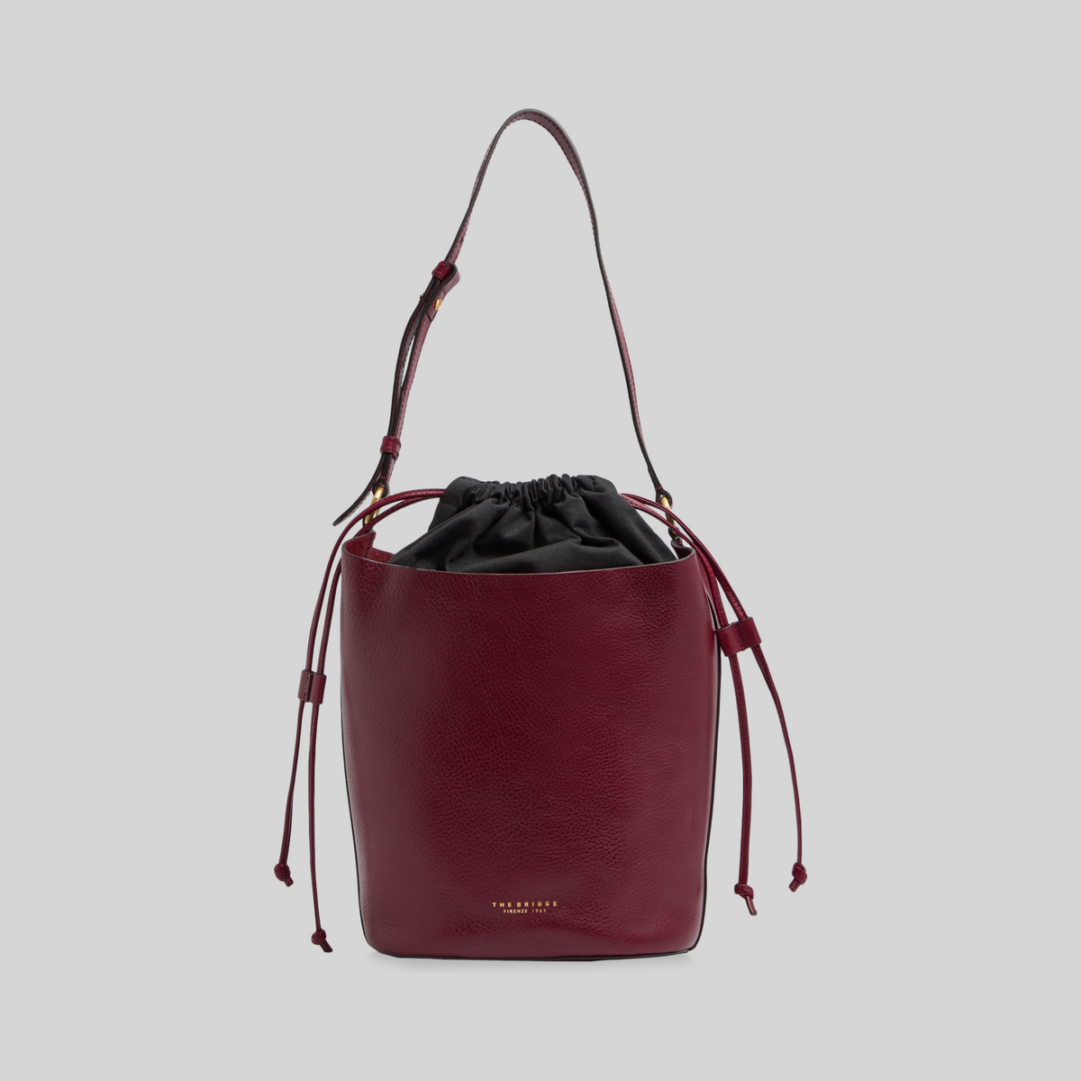 Borsa secchiello LIBUTTI linea Luce in pelle color Barolo con tracolla regolabile e sacca interna nera