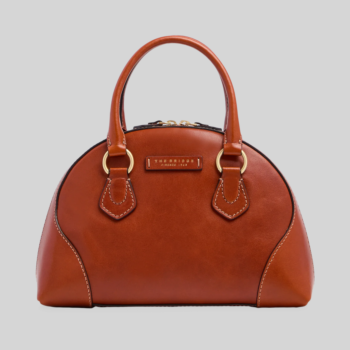Borsa LIBUTTI in pelle color cuoio con silhouette arrotondata, manici rigidi e dettagli in metallo dorato