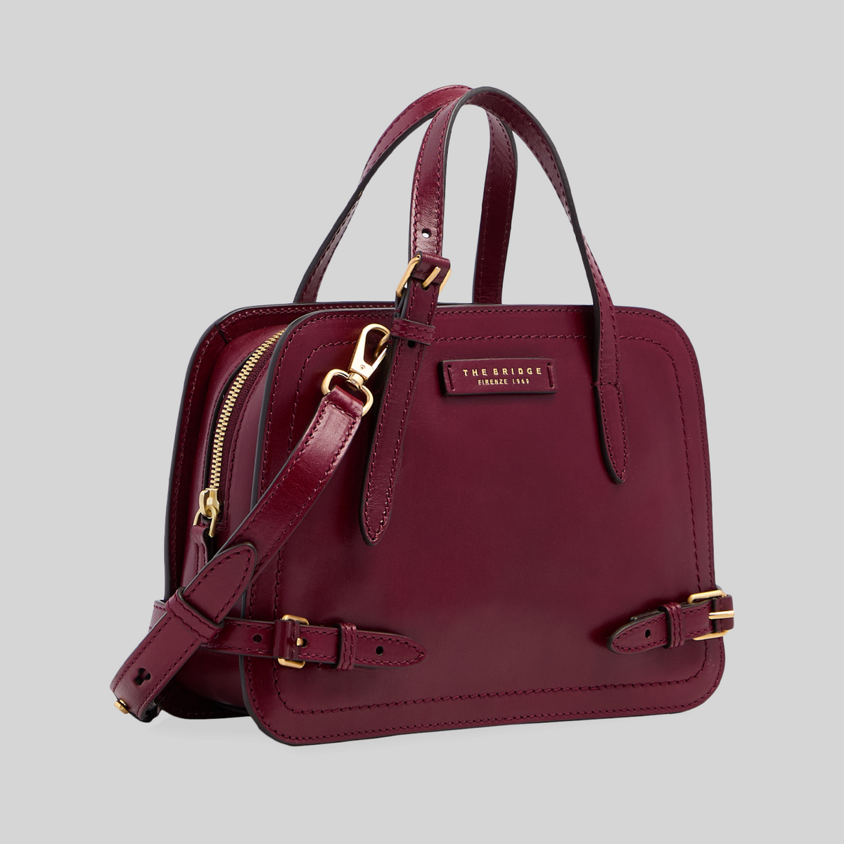 Borsa LIBUTTI The Bridge linea Monica in cuoio bordeaux con dettagli dorati e tracolla rimovibile