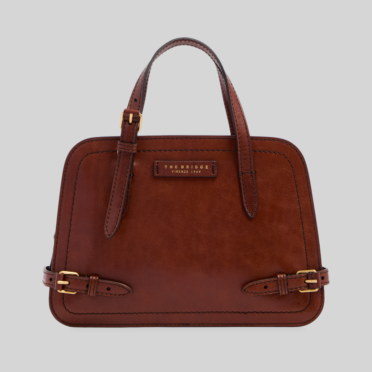 Borsa LIBUTTI The Bridge linea Monica in cuoio marrone con dettagli in metallo dorato e fibbie laterali