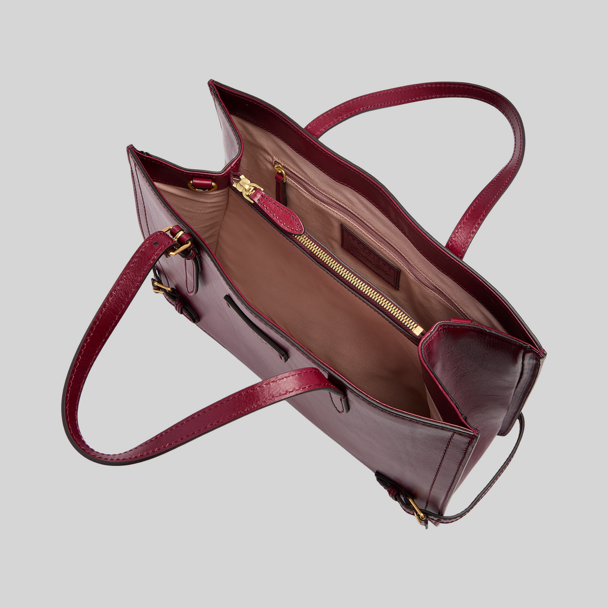 Borsa shopping LIBUTTI in pelle bordeaux con interno spazioso, cerniera dorata e manici lunghi