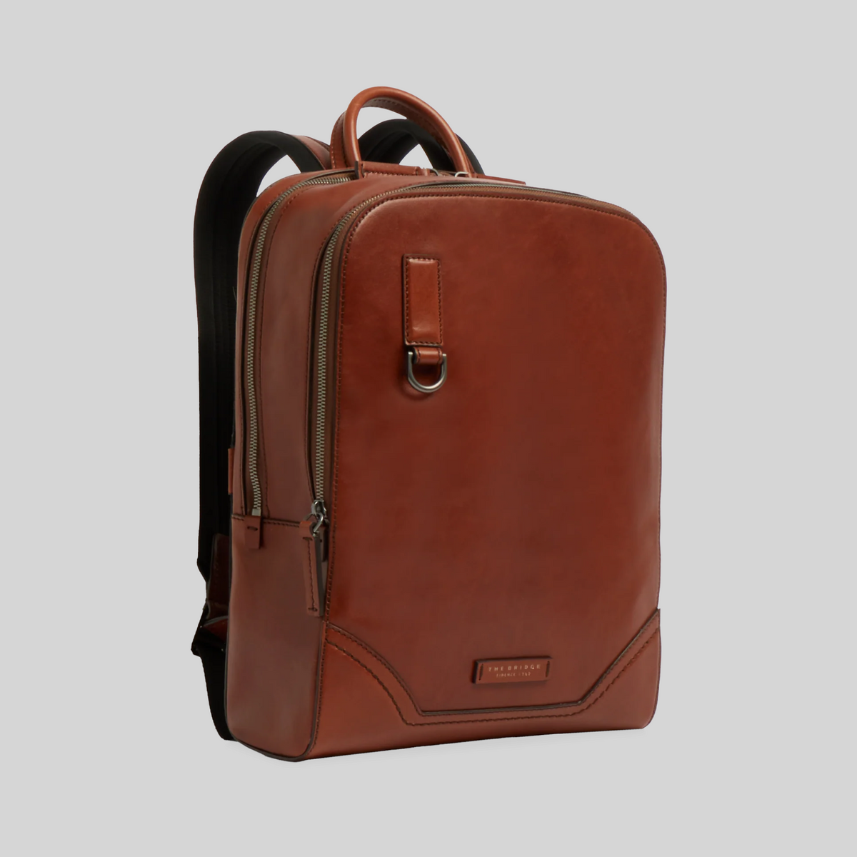 Zaino LIBUTTI in pelle marrone The Bridge con doppia zip, ideale per il trasporto di PC in ufficio o in viaggio.