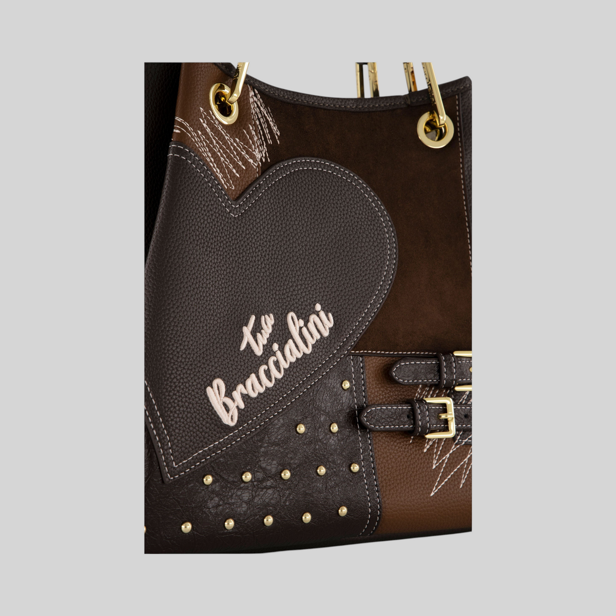Borsa a mano LIBUTTI Amy Patchwork in pelle marrone con dettaglio a cuore, borchie dorate e fibbie decorative
