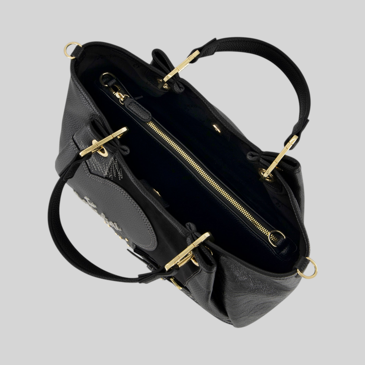 Borsa a mano LIBUTTI Amy Patchwork in pelle nera con dettagli dorati vista dall'alto