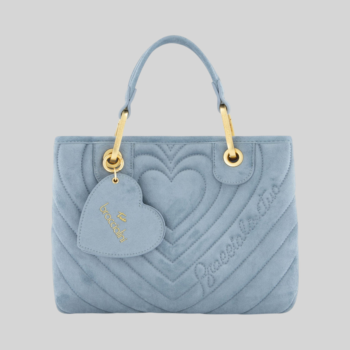 Borsa a mano LIBUTTI in suede azzurro con trapuntatura a cuori concentrici, doppi manici e ciondolo a forma di cuore