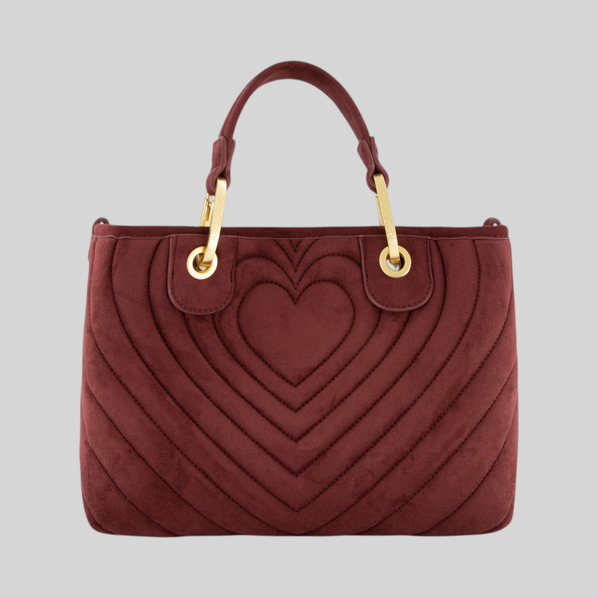 Borsa a mano LIBUTTI in suede bordeaux con trapuntatura a cuori concentrici, doppi manici e dettagli dorati.