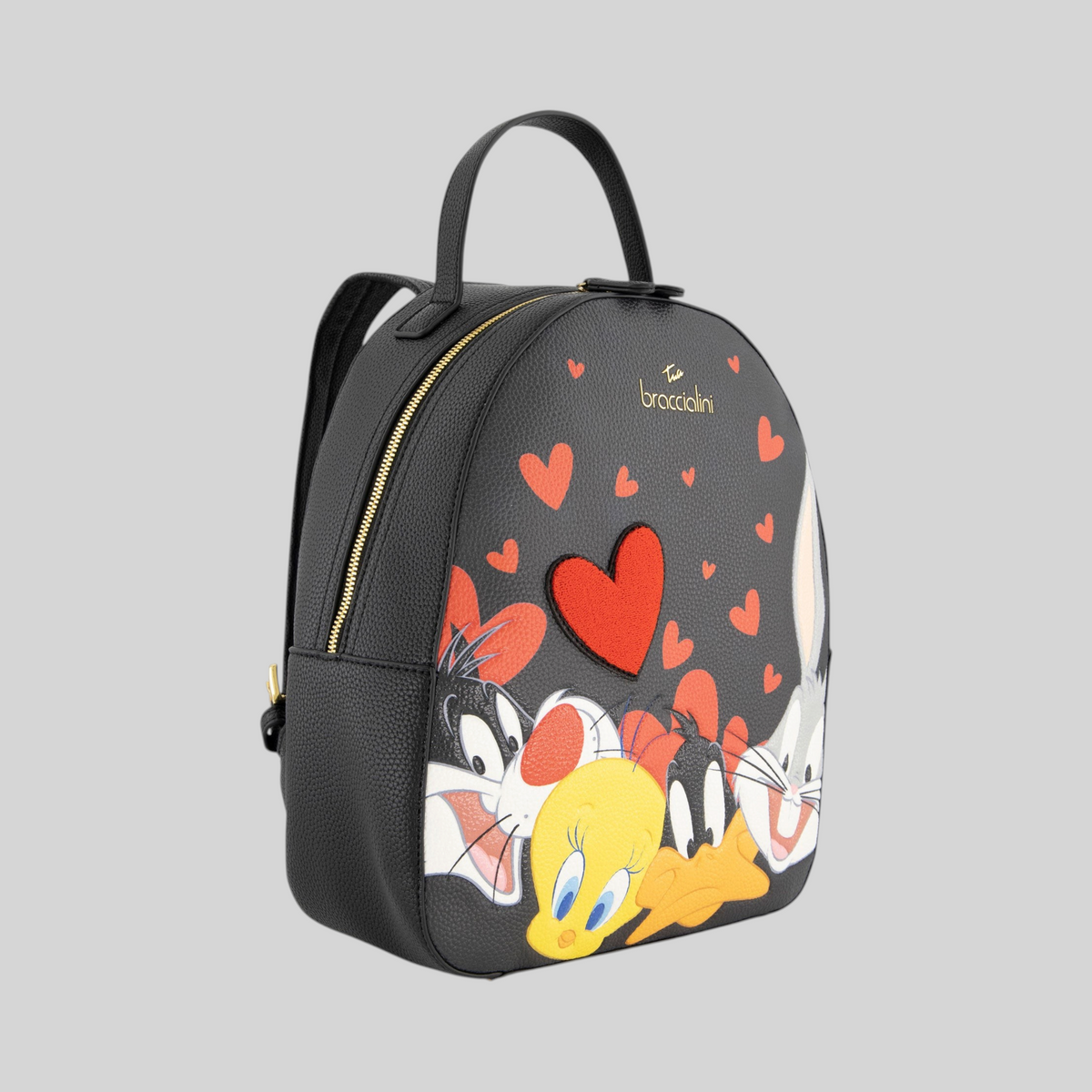 Zaino LIBUTTI nero con stampa Looney Tunes, cuori rossi applicati e dettagli dorati, vista laterale.