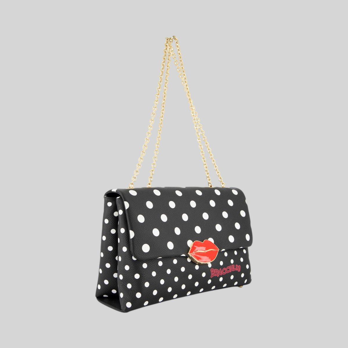 Borsa LIBUTTI Braccialini Kiss in pelle nera a pois bianchi con tracolla a catena dorata e dettaglio labbra rosse