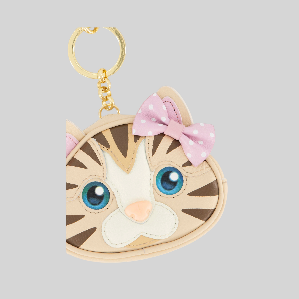 Portachiavi LIBUTTI a forma di gatto in pelle beige con fiocco rosa a pois e dettagli curati