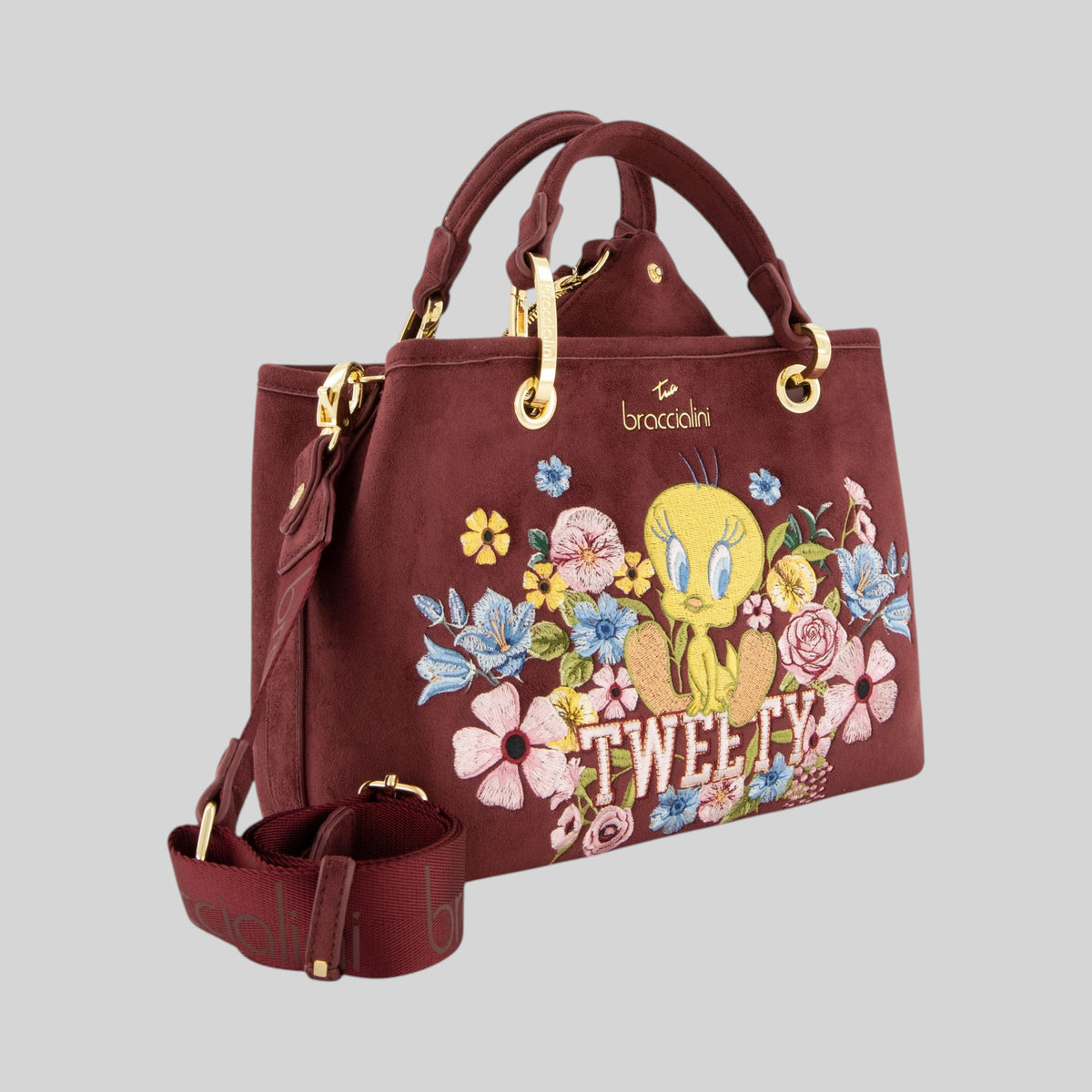 Borsa media LIBUTTI Braccialini in suede bordeaux con ricamo floreale, Titti e dettagli dorati, tracolla rimovibile.