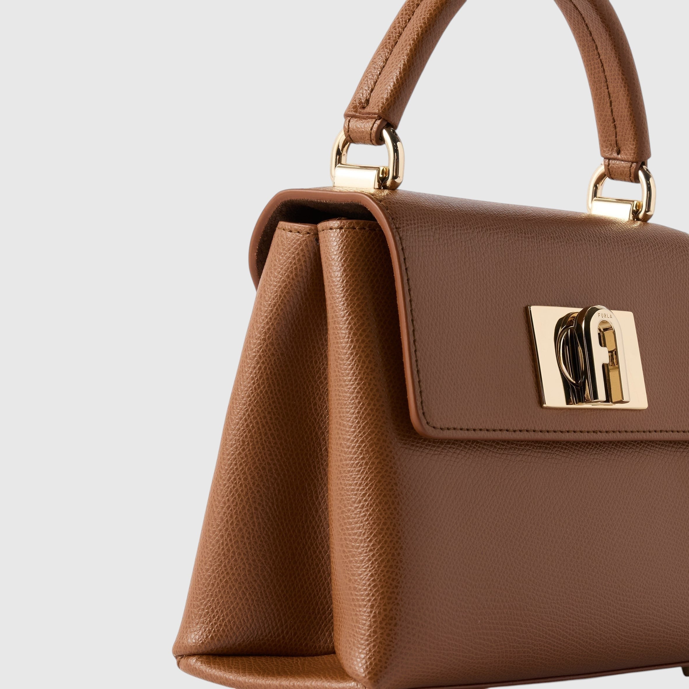 Mini borsa a mano LIBUTTI Furla 1927 in pelle marrone granata con chiusura a girello dorata e logo Arco